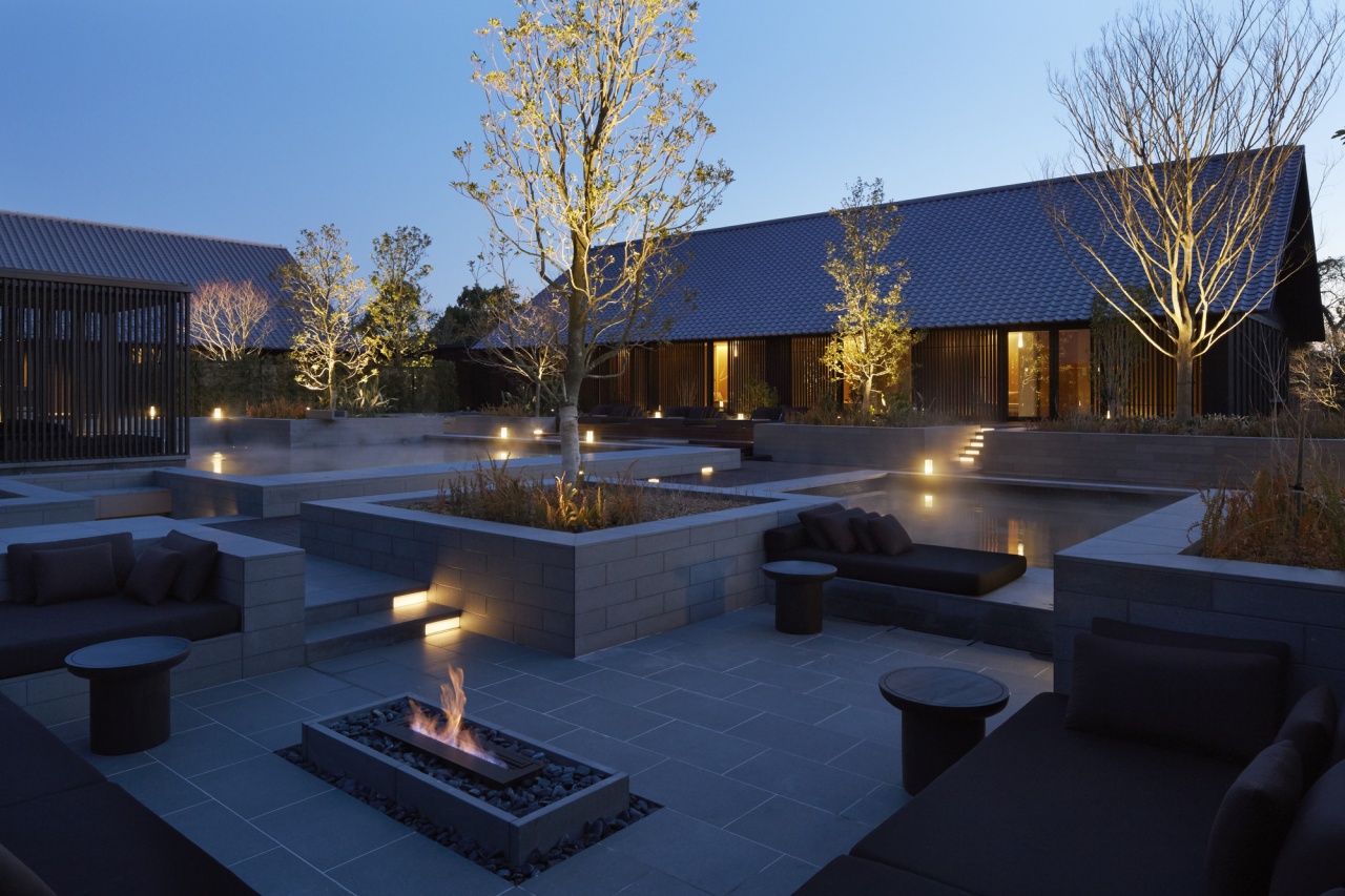 The resort's spa garden, onsen, daybeds and fireside lounge 